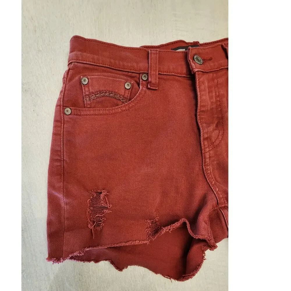 Levis Women's Cut off Denim Shorts SZ 4 Distressed Butterfly Patch Rust